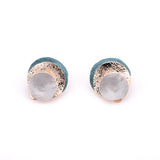 Three overlapping round earrings