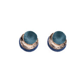 Three overlapping round earrings